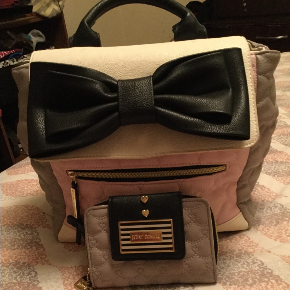 Pre-loved. Bag pack/purse and wallet.